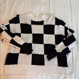 Elegant Black and White Checkered Sweater